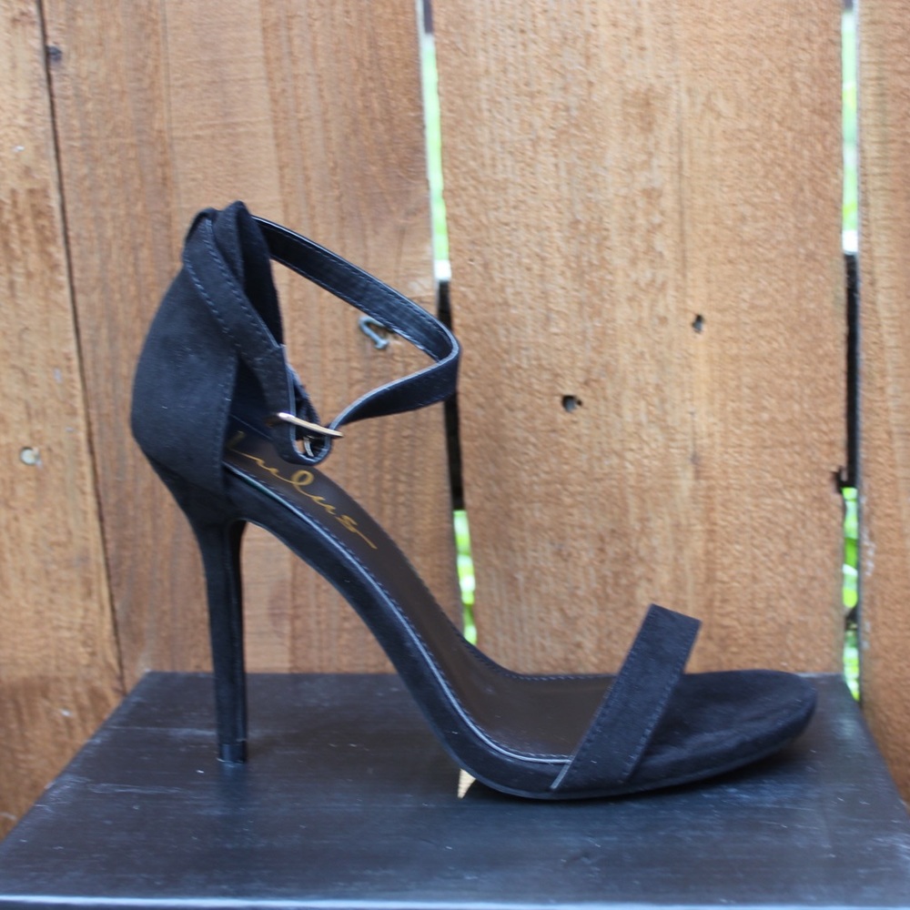 Black skinny heel shoes